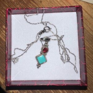 Elegant Silver Necklace with Turquoise and Red Accents